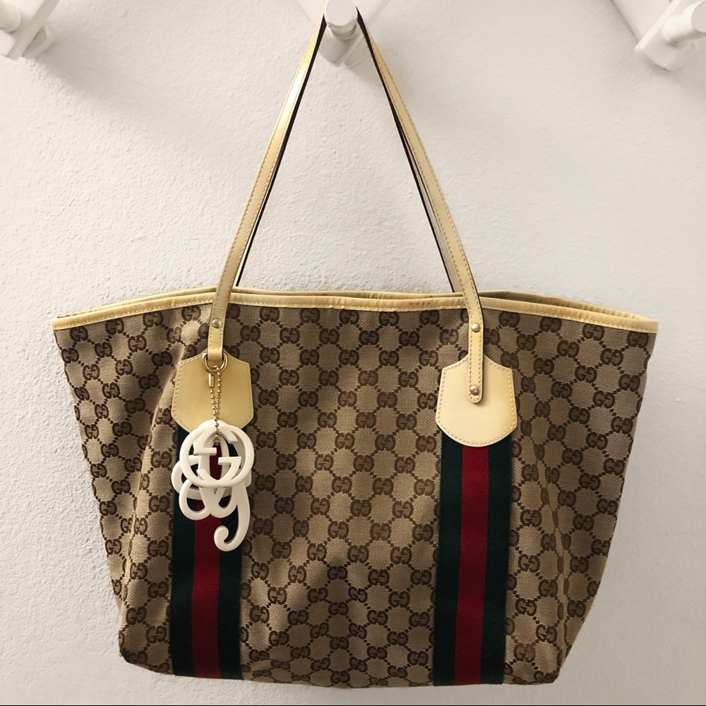 Authentic Gucci shoulder bag with charms